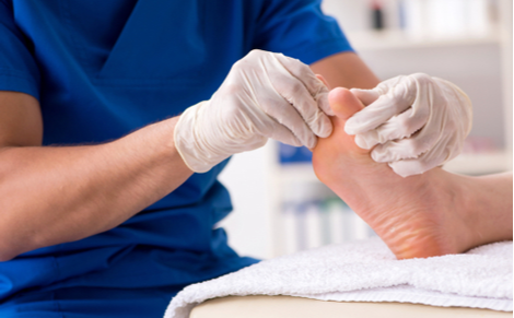 Picture of podiatrist looking at foot